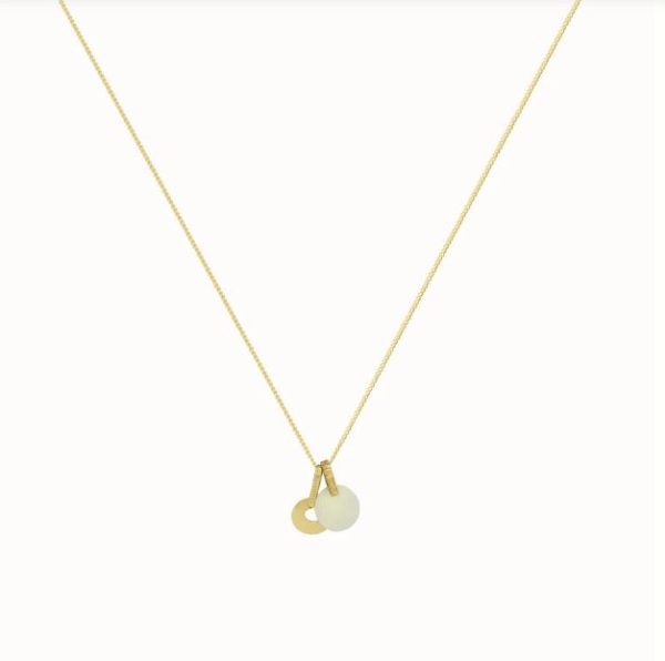Flawed ivory charm gold